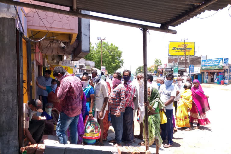 no physical distance between people at karimnagar bank