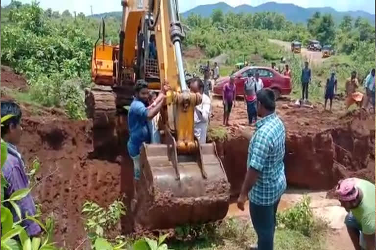 Helping the sick woman with jcb at kongapakala, visakhapatnam district