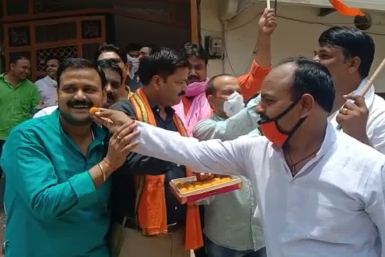 Activists celebrate after Imrati Devi was made BJP minister