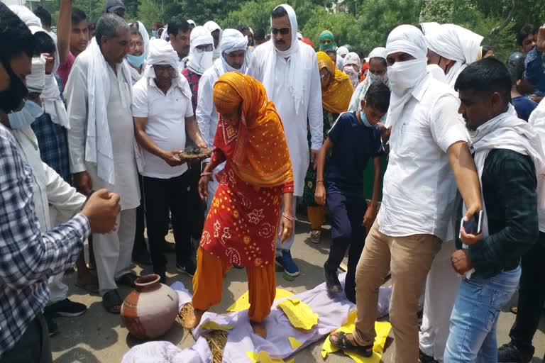 sacked pti teachers burnt effigy of sports minister sandeep singh