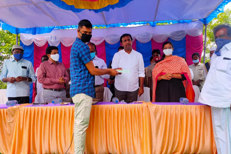 Distribution of checks to the residents of Gandikota reservoir