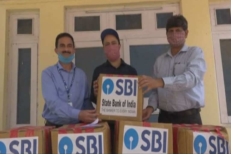 Doda SBI Donate PPE Kits To District Administration Doda