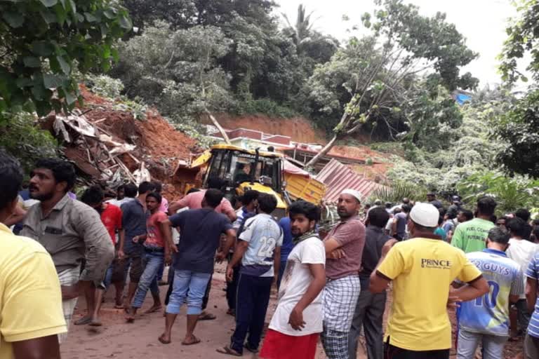 hill-collapse-two-children-trapped-under-mud