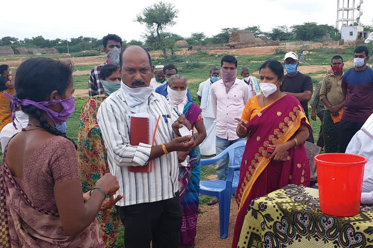 Distribution of house place by lottery in Madikkera kurnool district