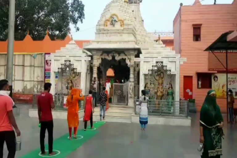 Devotees queuing up with social distancing at Dudheshwar temple Ghaziabad on first Monday of Sawan