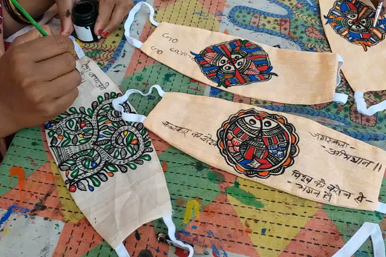 Trying to make people aware of the corona virus by mithila painting on masks