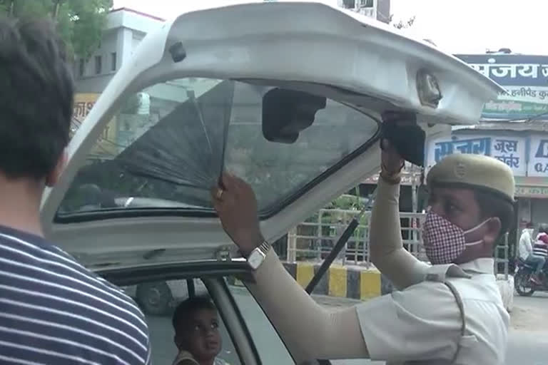 traffic police cut challans against black film-maker on car in Bhiwani