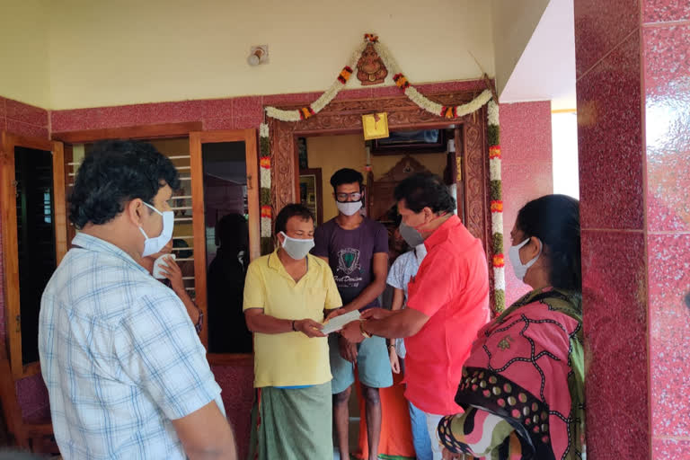 Distribution of relief money to the family of a woman who collapsed and died