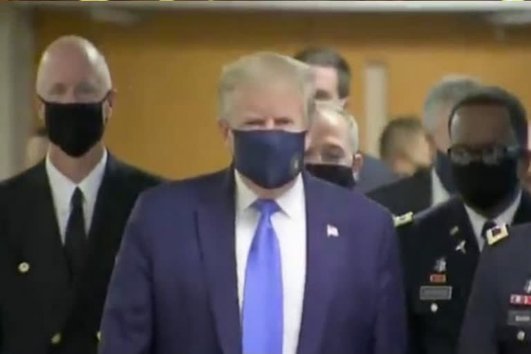 In a first, Trump dons mask as US' COVID death toll surpasses 1,34,000