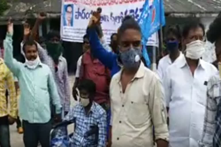 protest in cadapa dst  chinnamandem mandal due to agianst attacks on low cast people