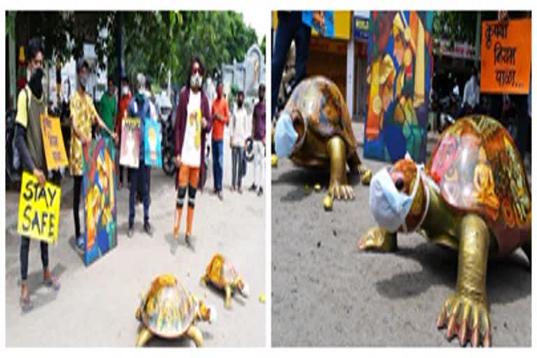 awarness regarding to using mask through turtles art in solapur