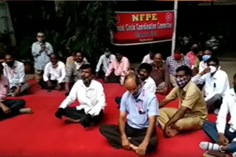 postal employees protest at abids postal sadan in Hyderabad