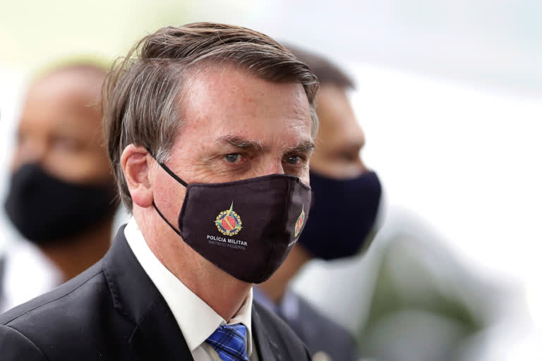 Brazil's Bolsonaro  positive coronavirus test result  coronavirus  coronavirus test  Brazilian President  World Health Organization  pandemic mingling in crowds  hydroxychloroquine  ബ്രസീല്‍  ജെയര്‍ ബോള്‍സൊനാരോയുടെ രണ്ടാമത്തെ പരിശോധനാഫലവും പോസിറ്റീവ്  ജെയര്‍ ബോള്‍സൊനാരോ  covid 19  കൊവിഡ് 19