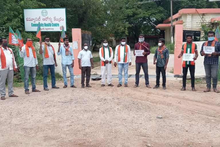 bjp leaders protest at husnabad