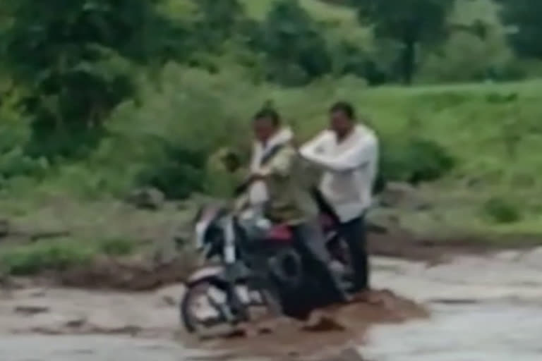 A young man drifting in the river