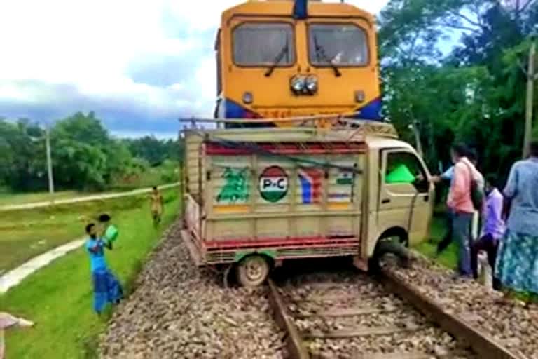 accident in karimganj between truck and train