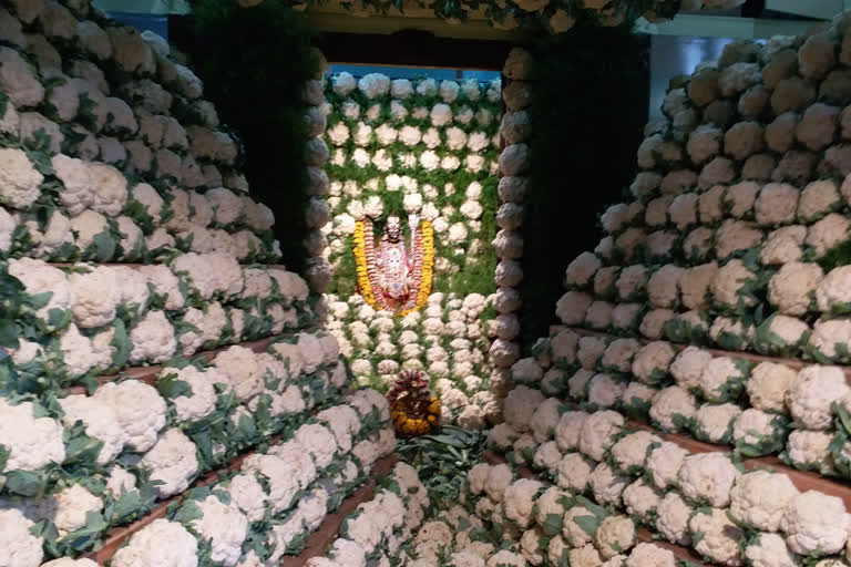 The devotees did Cabbage Decoration to goddess Chamundi to free world from corona in madya, karnataka