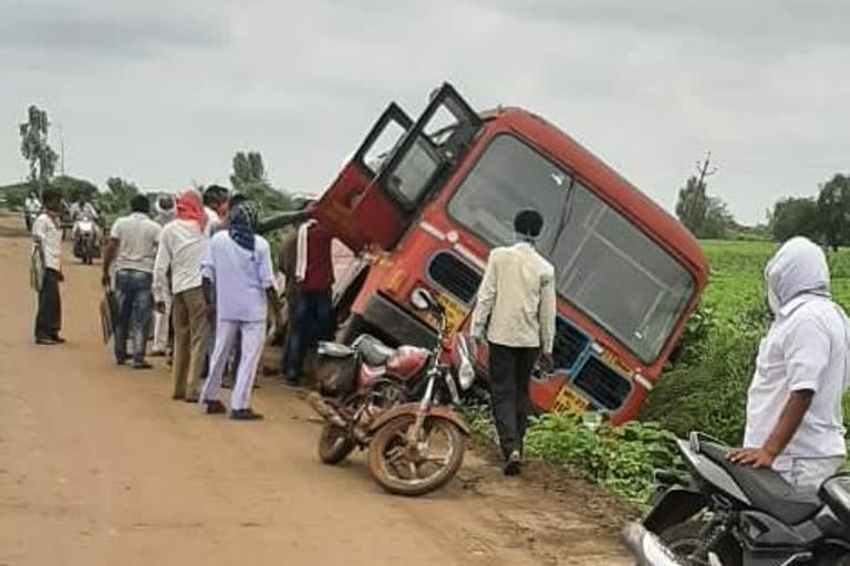 bus skidded off the muddy road and fell into a ditch parbhani