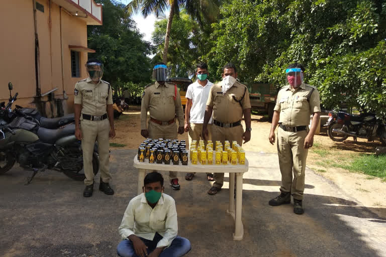 karnataka liquor seized and a person caught in ananthapur district police