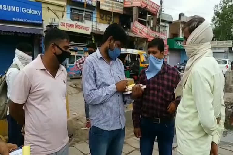 rewari district administration cut challan people who don't wear face mask