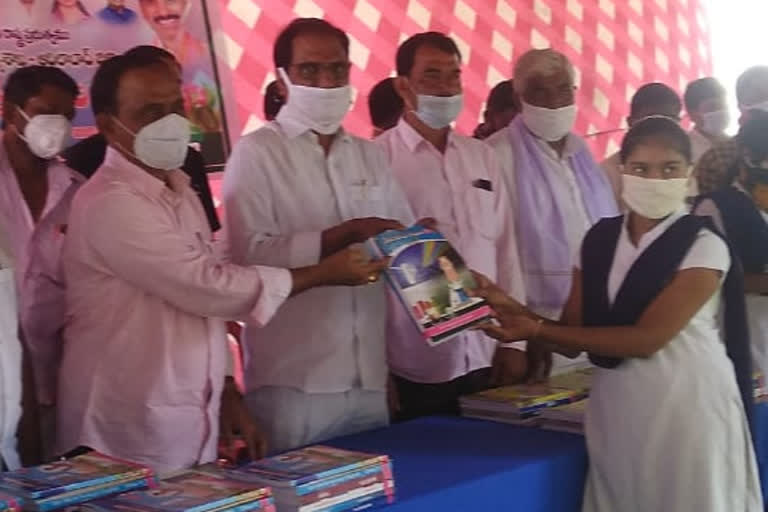 adilabad zp chairman distributed textbooks to students