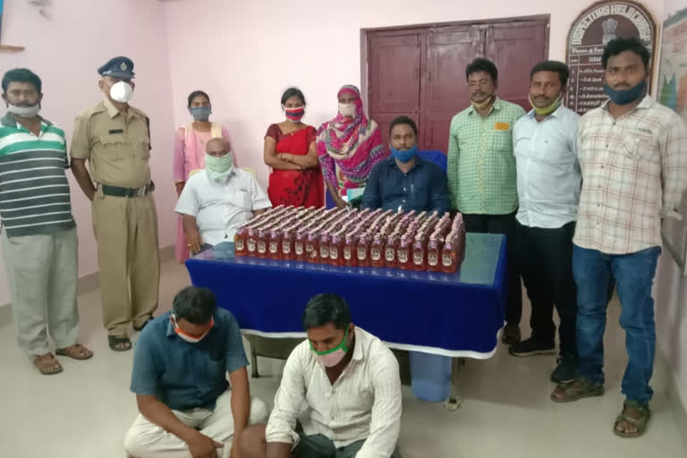 police arrested two people while selling telanga liquor