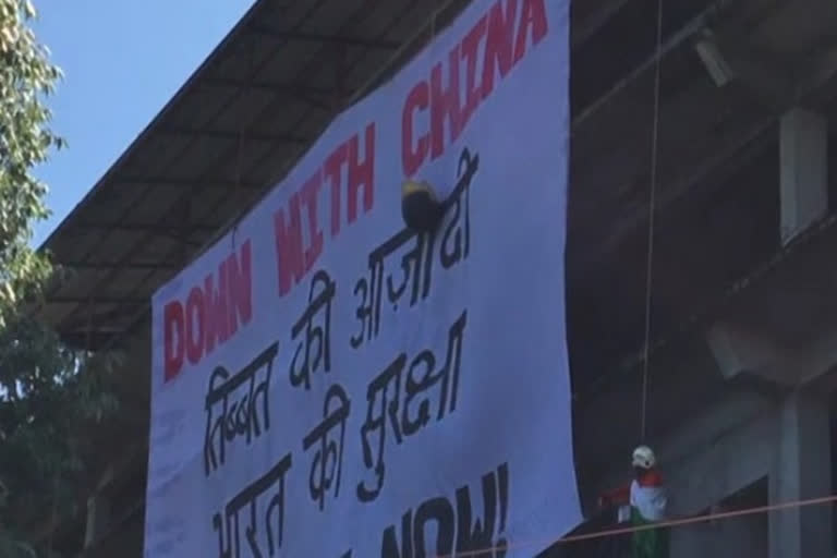 On CCP's founding anniversary, Tibetan protesters unfurl anti-China banner