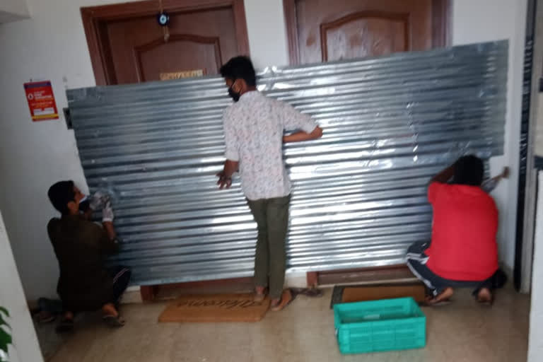 BBMP sealed doors of 2 flats in steel sheets