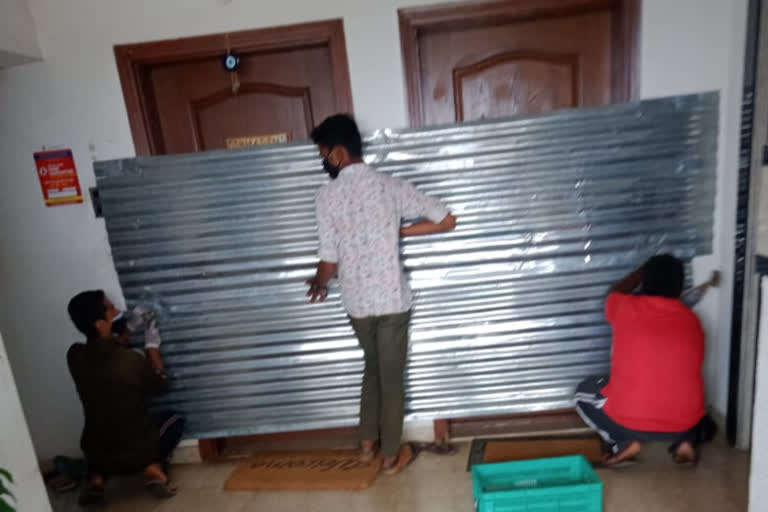 banglore municipality sealed doors of 2 flats with steel sheets in dommalur