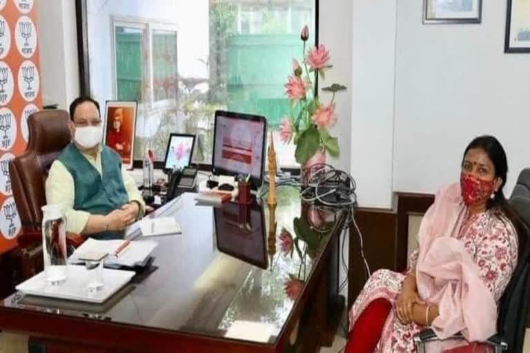 Indu Goswami with JP Nadda