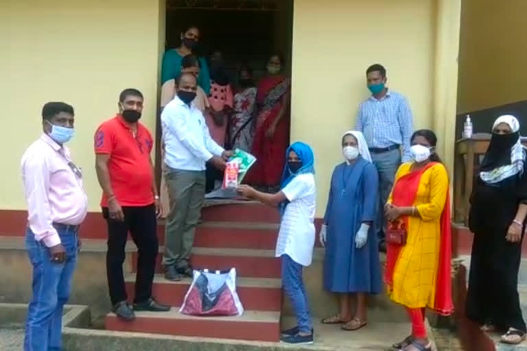 Distribution of food items to school children