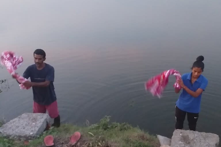 footballer  washing peoples clothes