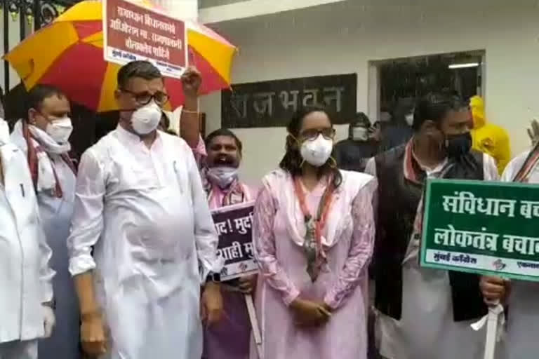 Congress leaders protest in front of Raj Bhavan in heavy rains