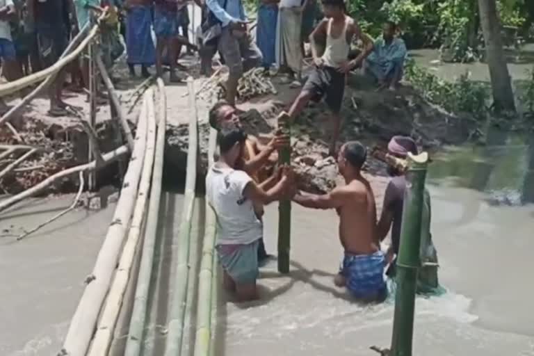 people made bamboo bridge at rangia