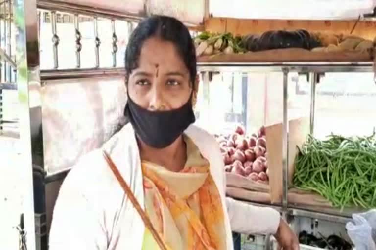 A woman living a vegetable sales career