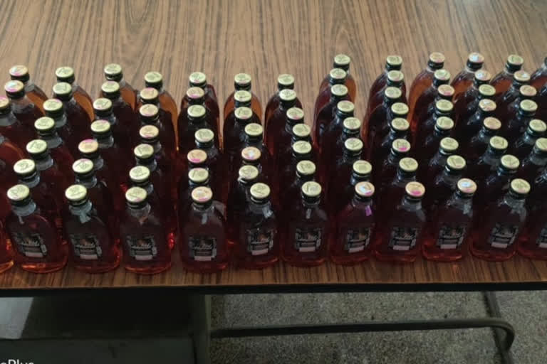 Seizure of Telangana liquor from a suspiciously wandering man in kurnool district