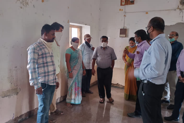 Commissioner of Education inspecting school buildings