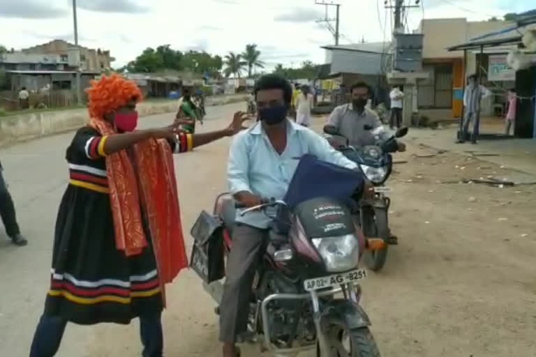 కరోనా వేశధారి ద్వారా అవగాహన