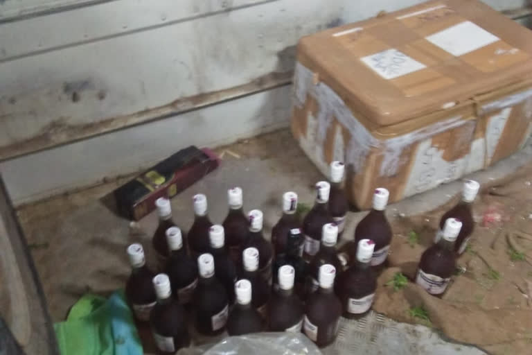 liquor bottles in kadapa rtc cargo bus