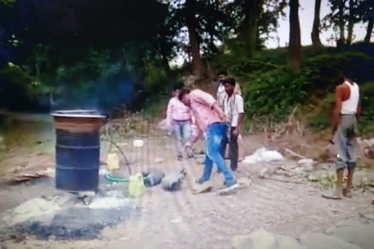 destroying liquor kiln in forest