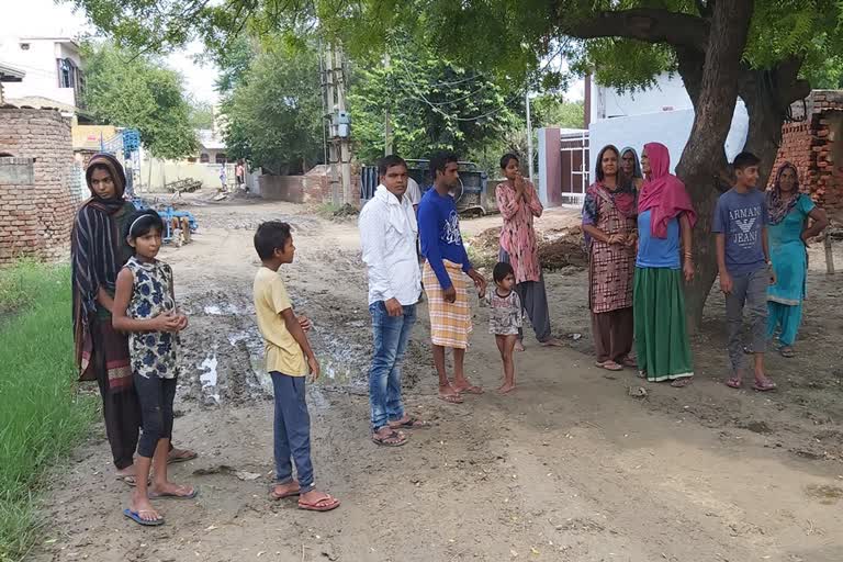 villagers upset due to water logging in sihol village main road palwal