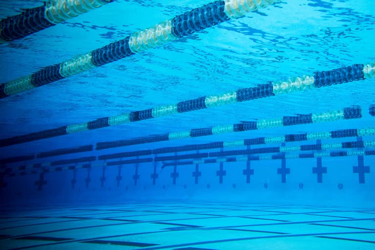 Swimmers fret over staying out of pools, say it's taking a toll mentally