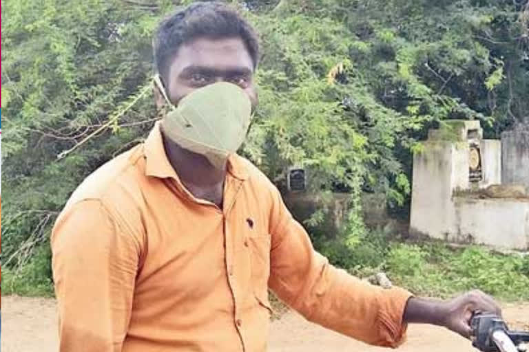 a young man wore a leaf mask in mahabubabad district