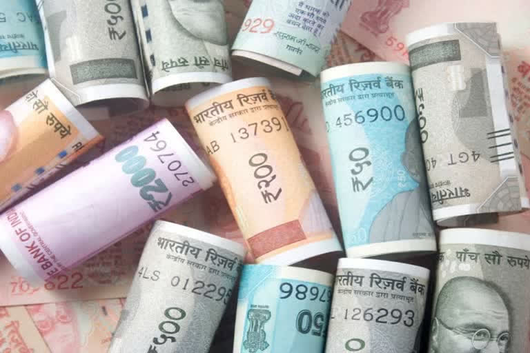 Rupee depreciates by 20 paise against dollar