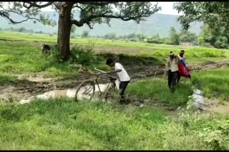 Stuck with mud roads and potholes, villagers demand good roads from years