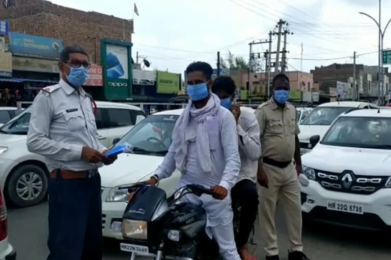 fatehabad police started two days mask awareness campaign