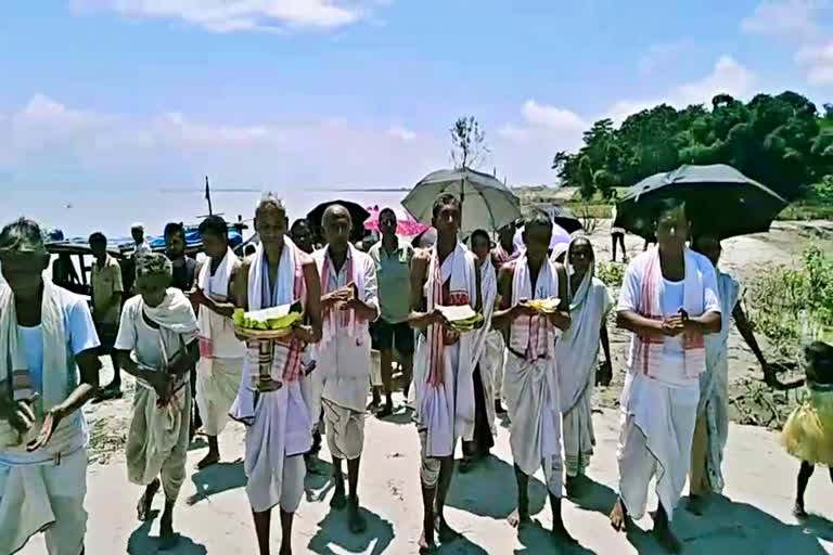 river people worshipping river Brahmaputra in Lakhimpur