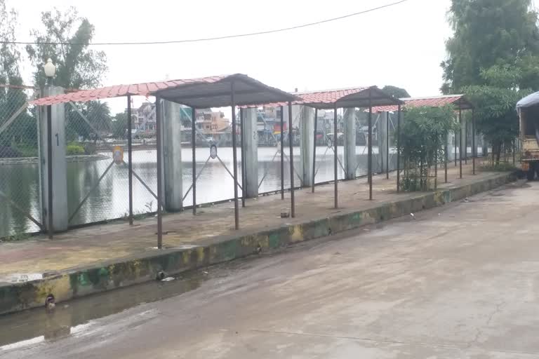 Shops built along the small pond are lying waste