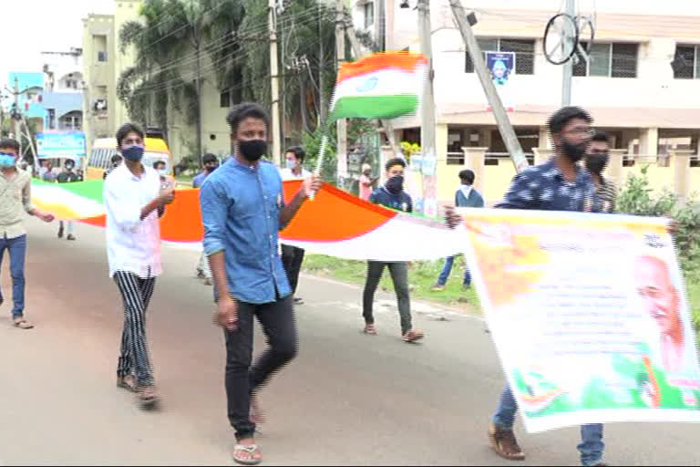 friends helping hands welfare society  made a march with  60 feet national flag in vijayangaram