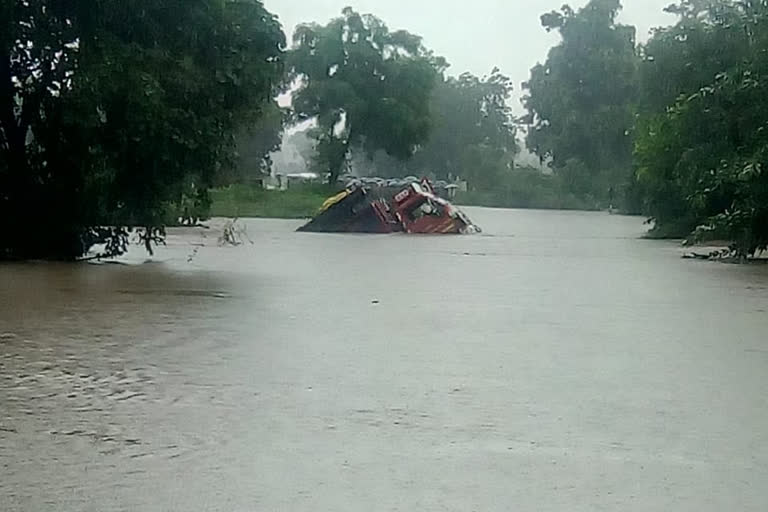 The truck swept away